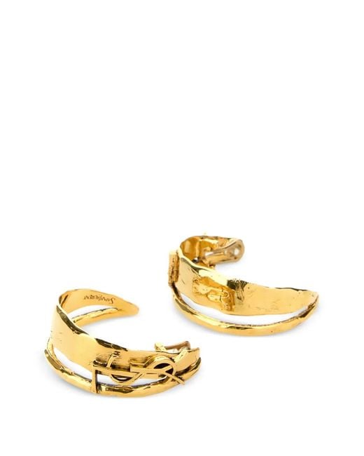 Pendientes Cassandre Saint Laurent de color Metallic