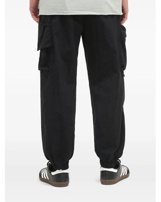 Musium Div. Black Logo-Patch Track Pants for men