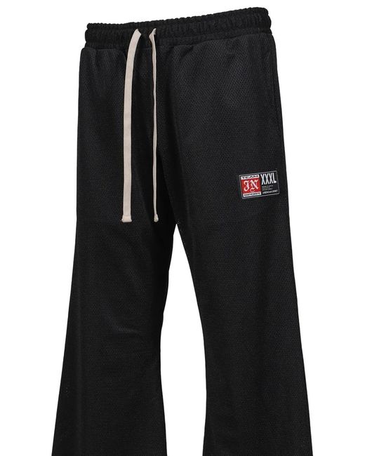 JUN/NAKAYAMA Black Mesh Logo-Patch Track Pants for men