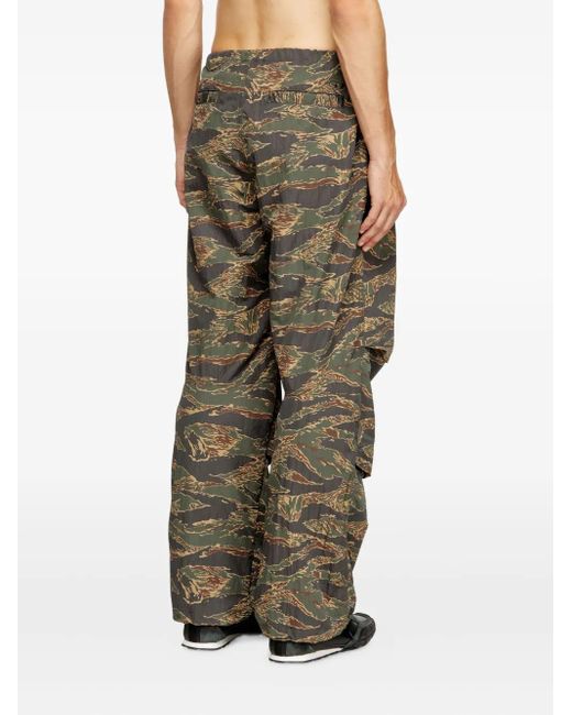 DIESEL Green Graphic-Print Trousers for men