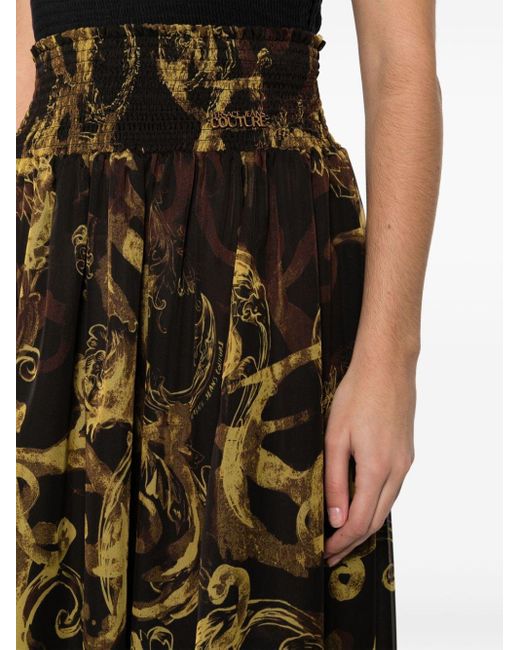 Falda larga con estampado Watercolour Couture Versace de color Black