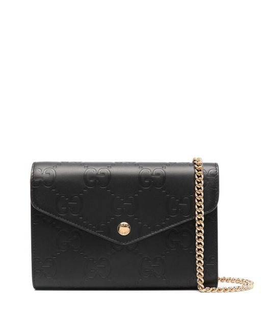 Gucci Black Debossed G Monogram Crossbody Bag