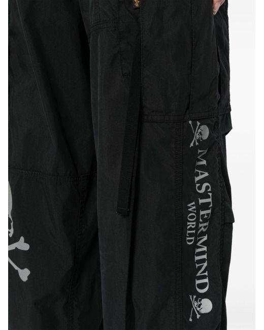 MASTERMIND WORLD Black Logo-print Cotton-blend Trousers for men