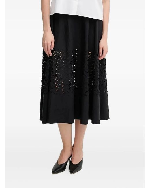 Falda midi acampanada Sandro Ferrone de color Black