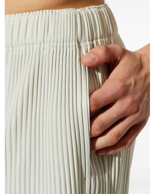 Homme Plissé Issey Miyake White Pleated Trousers for men