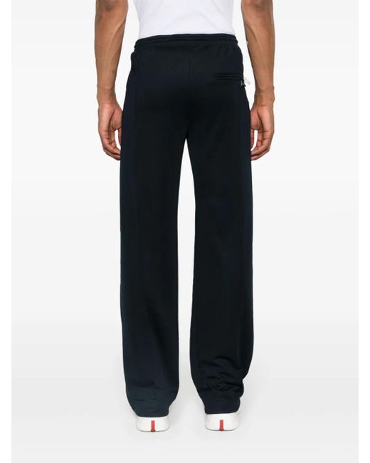 Courreges Black Logo-Patch Interlock Track Pants for men