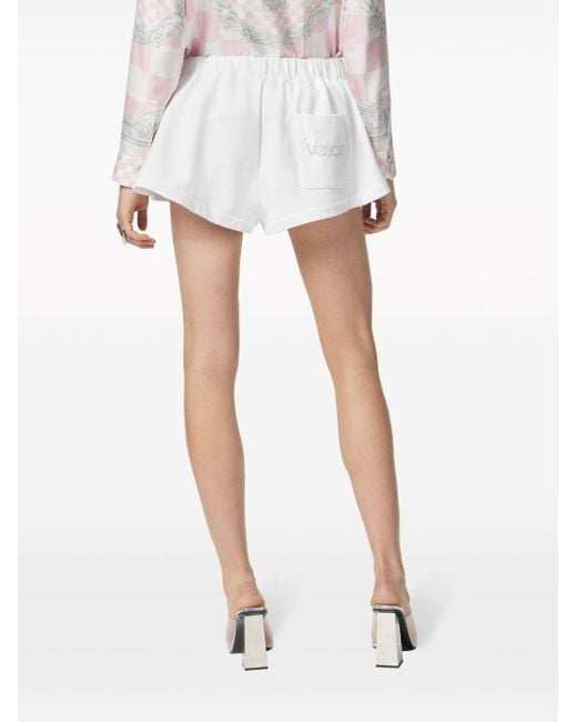 Shorts con ricamo di Versace in White