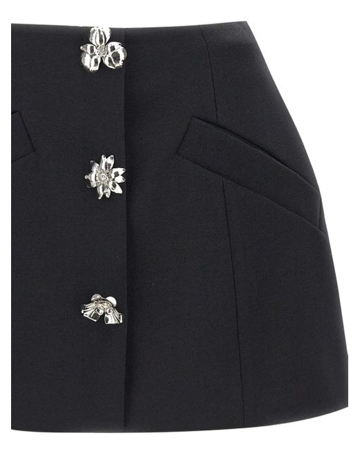 Minifalda con aplique floral Blumarine de color Black