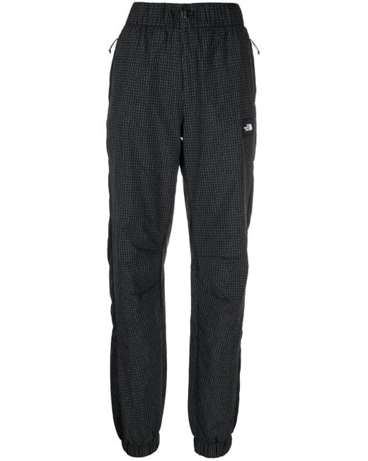 The North Face Gridcheck Tapered joggers in Black Lyst