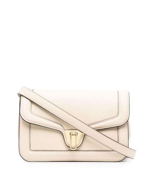 Coccinelle Leather Medium Marvin Twist Crossbody Bag in Natural | Lyst ...
