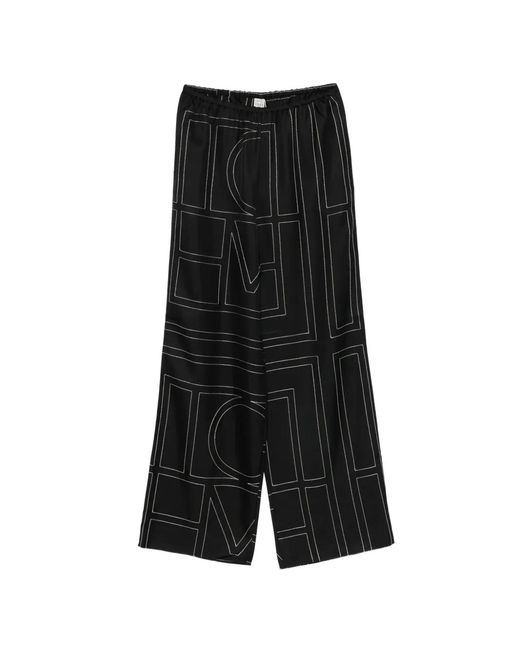 Totême Black Monogram Silk Trousers