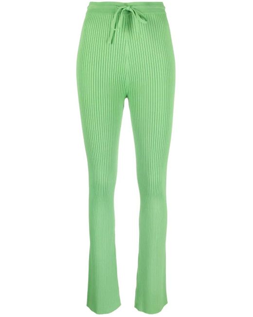 Pantalones de canalé Cornelie acampanados Nanushka de color Green