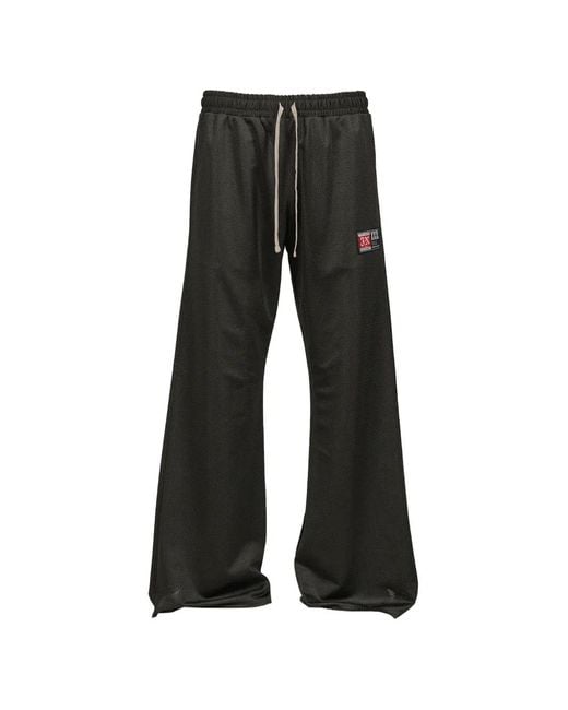 JUN/NAKAYAMA Black Logo-Patch Mesh Track Pants for men