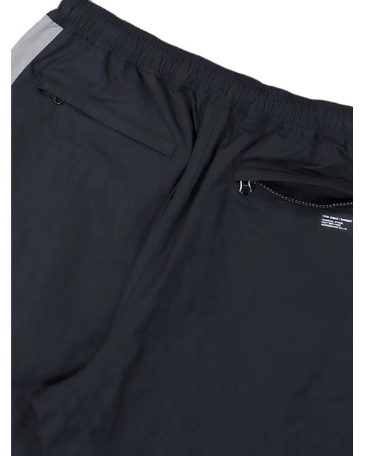 Neighborhood Blue Colour-Blocking Panelled Track Pants for men
