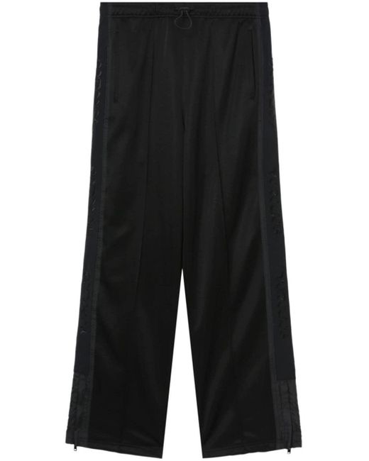 Pantalones de chándal con franja del logo Toga de hombre de color Black