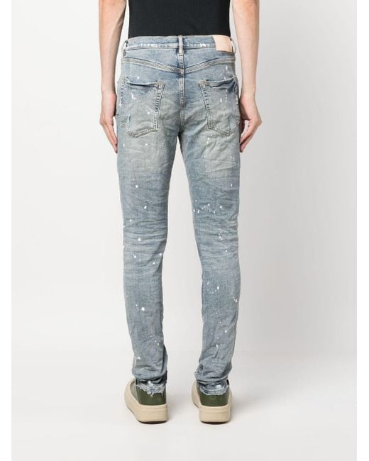 https://cdna.lystit.com/520/650/n/photos/farfetch/e2805123/purple-brand-blue-Ripped-detail-Mid-rise-Jeans.jpeg