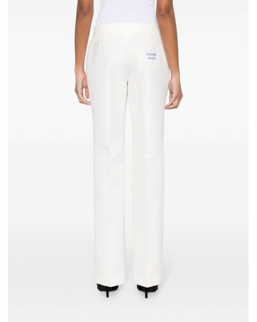 Pantalones con parche Moschino de color White