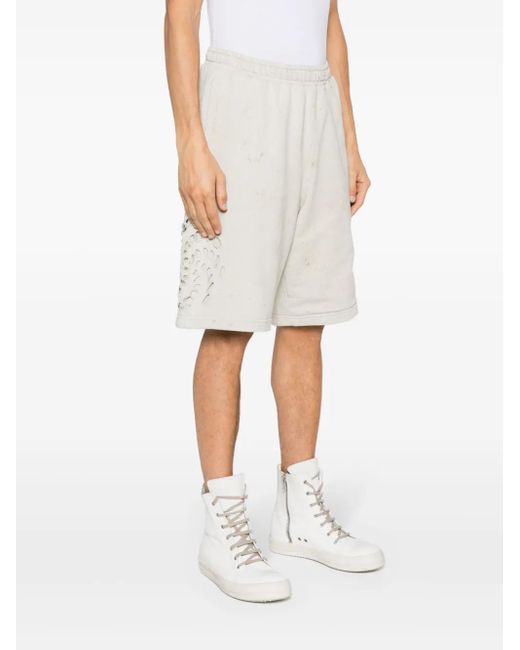 44 Label Group White Trip Distressed Shorts