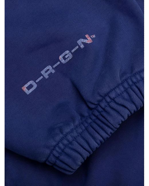 D-R-G-N Blue Origins Bleached Track Pants for men