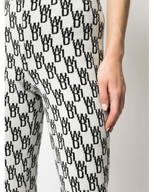 we11done White Logo Pattern Knitted Leggings
