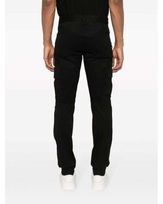 Pantaloni con tasche cargo di Balmain in Black da Uomo
