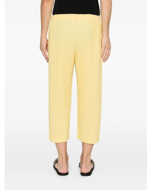 Homme Plissé Issey Miyake Yellow Tailored Pleats Cropped Trousers for men