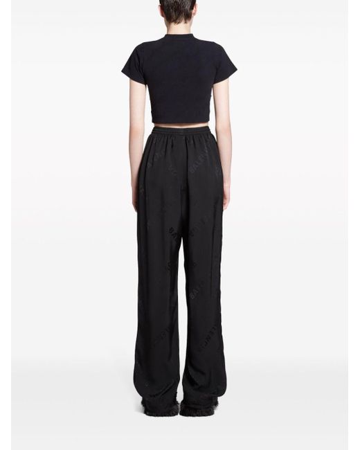Pantalones anchos con logo en jacquard Balenciaga de color Black