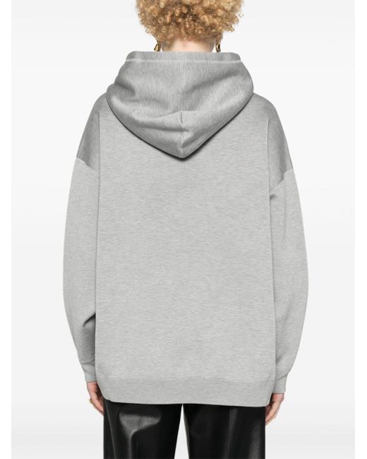Effet hoodie à logo embossé Gucci en coloris Gray