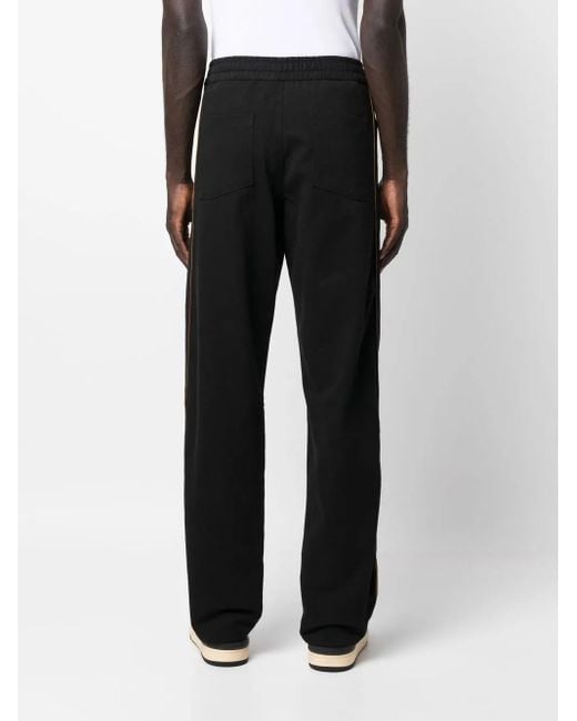 Rhude Black Side Stripe Detail Track Pants for men