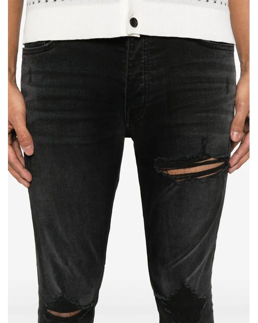 Amiri Black Distressed Skinny Jeans for men