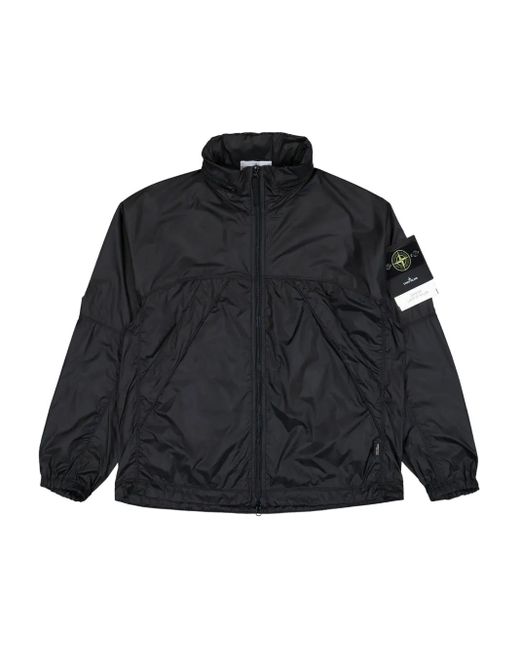 Giacca A Vento Con Zip E Cappuccio Ripiegabile di Stone Island in Black da Uomo