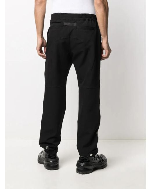 1017 ALYX 9SM Black Stripe Panel Trackpants for men
