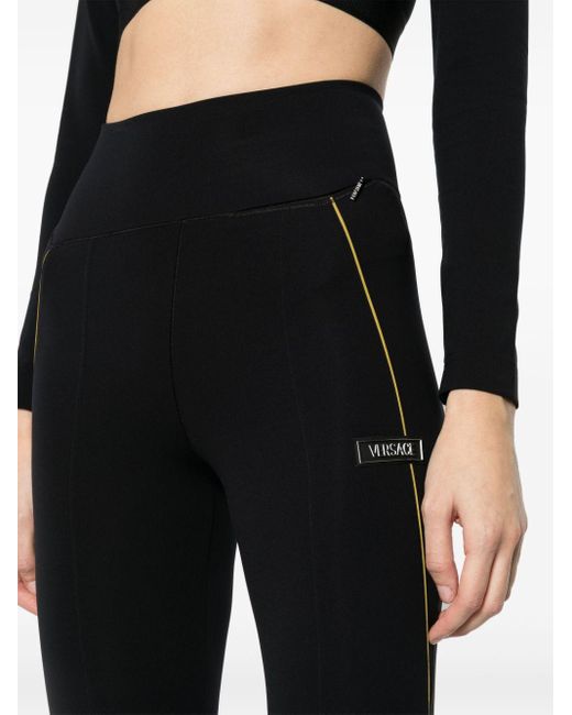 Versace Flared legging Met Logo-applicatie in het Black