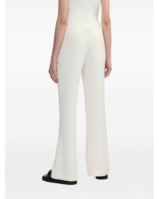 J.W. Anderson White Tech-Jersey Flared Trousers