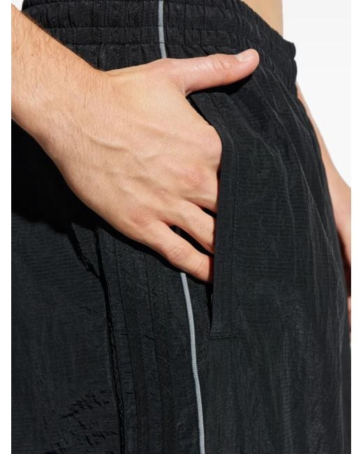 Pantalones elásticos con diseño curvo Adidas de hombre de color Black