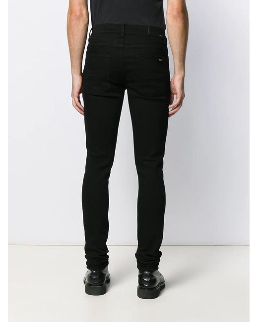 Amiri Black Broken Skinny Jeans for men