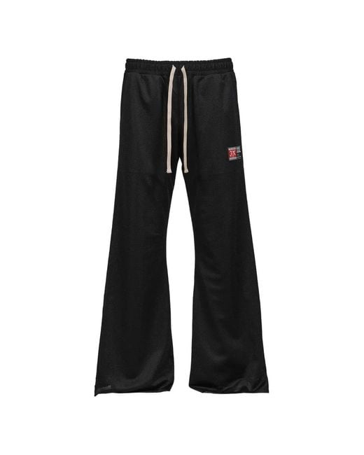 JUN/NAKAYAMA Black Mesh Logo-Patch Track Pants for men