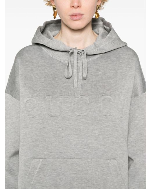 Effet hoodie à logo embossé Gucci en coloris Gray