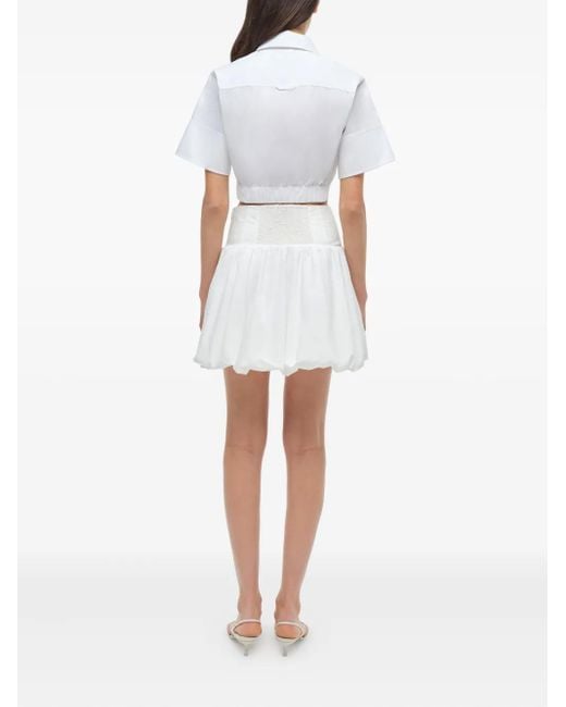 Jonathan Simkhai White Pippa Minirock mit Ballonsaum