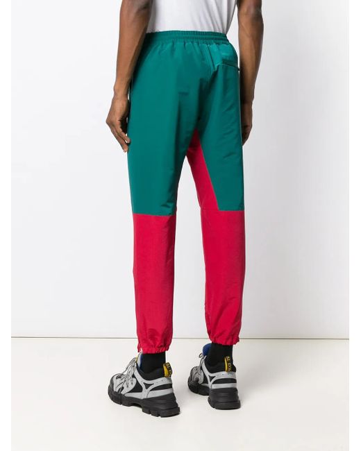 JohnUNDERCOVER Red Colour-Block Track Trousers for men