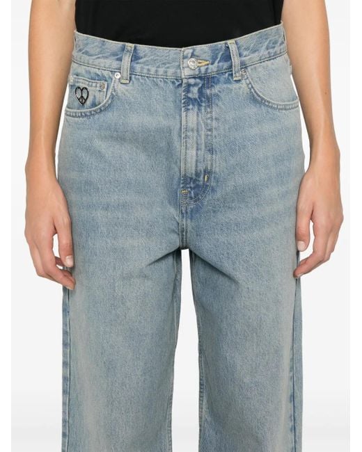 Jean À Patch Logo Moschino en coloris Blue