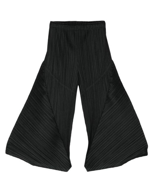 Pantaloni crop plissettati di Pleats Please Issey Miyake in Black