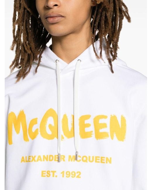 Sudadera con capucha y logo en grafiti Alexander McQueen de hombre de color White
