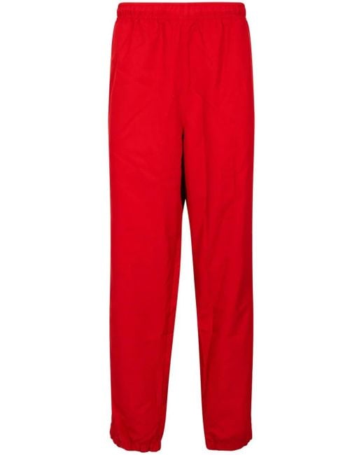 Supreme Red X Lacoste Track Pants for men