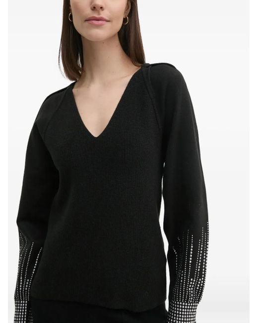 Jersey con apliques y cuello en V DKNY de color Black