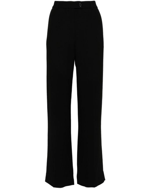 Pantalones rectos con pinzas Totême  de color Black