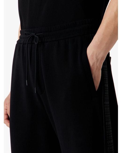 Pantaloni sportivi con stampa di Emporio Armani in Black da Uomo