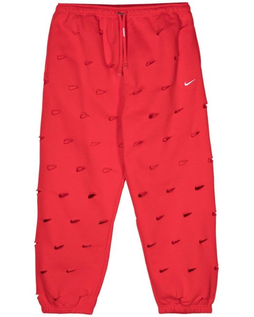 X Jacquemus pantalon de jogging Swoosh Nike en coloris Red