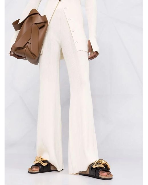 Remain White Fine-Ribbed Flared Trousers