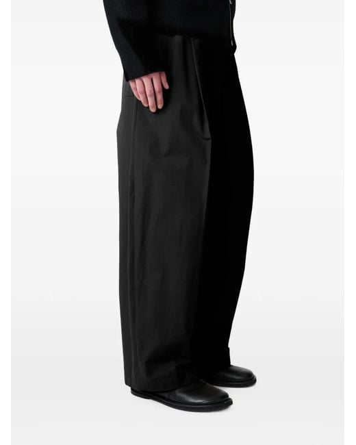 Studio Nicholson Black Shire Pleated Cotton Trousers for men